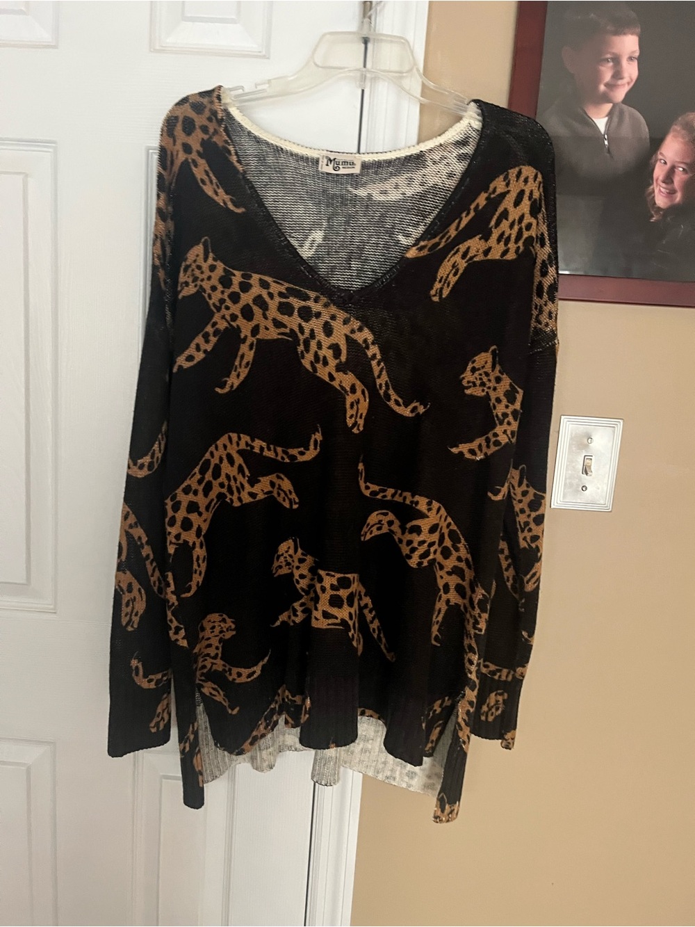 Show me your Mumu Medium Knit Top in Black and Cream animal print